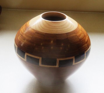 This segmented vase of various woods won a Highly Recommended certificate for Chris Whittle